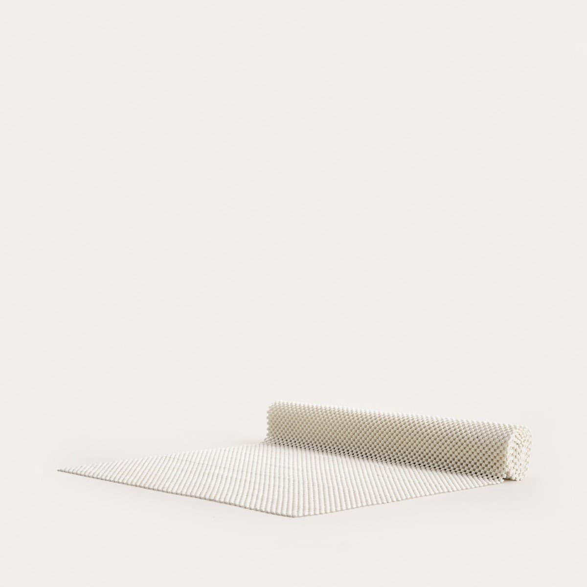 Silikónová podložka do zásuvky HOMLA LUCENS, krémová, 150 × 45 cm